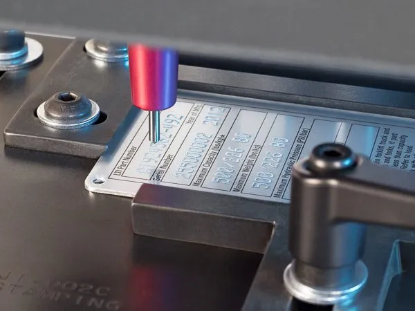Dot-peen marking fixture for metal nameplates