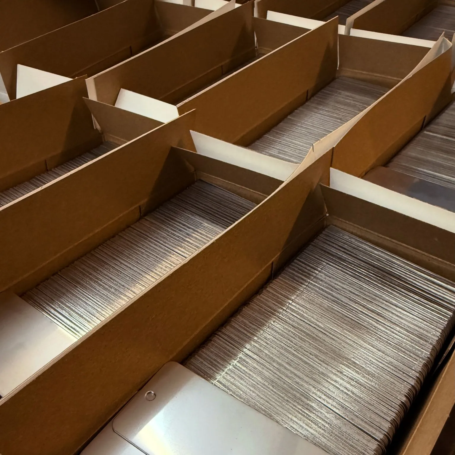 Laser-engraved aluminum nameplates on curved industrial automation equipment
