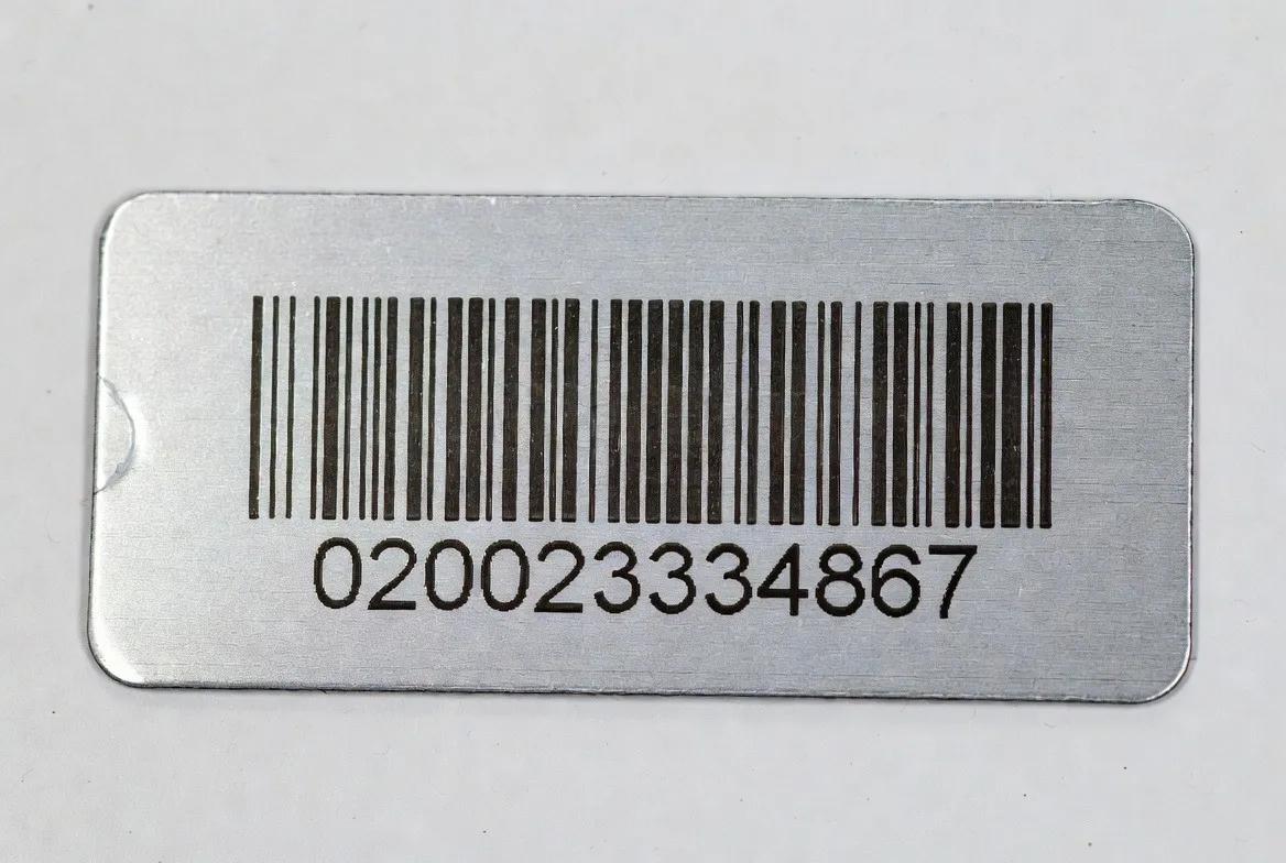 Close-up metal barcode asset tag