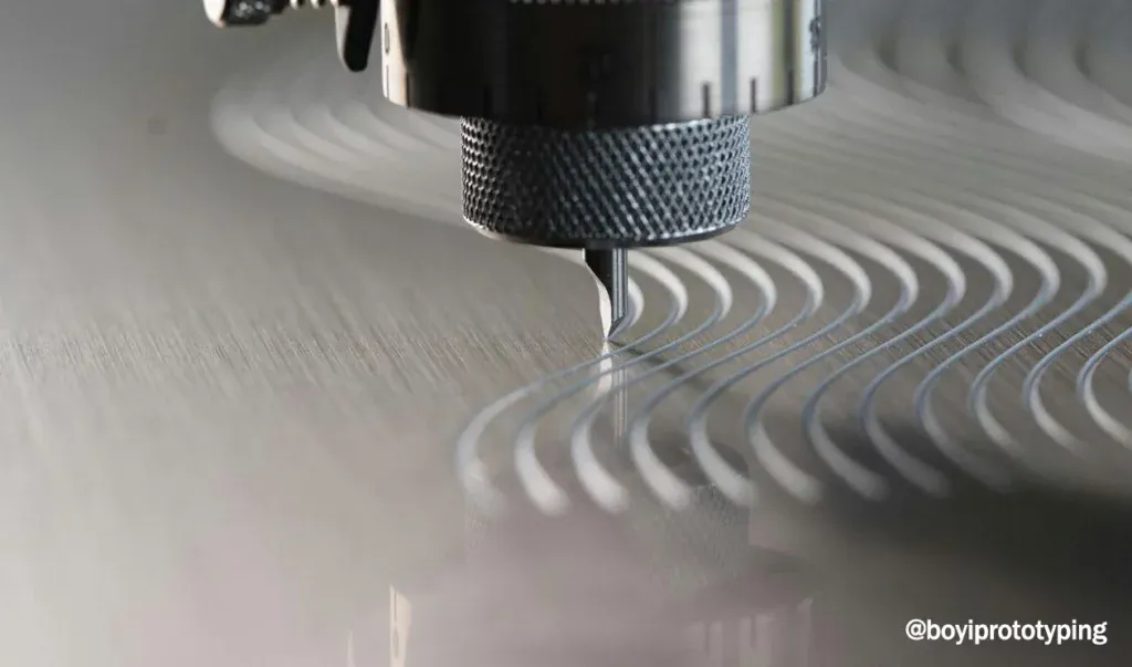 Metal engraving machine producing custom nameplates