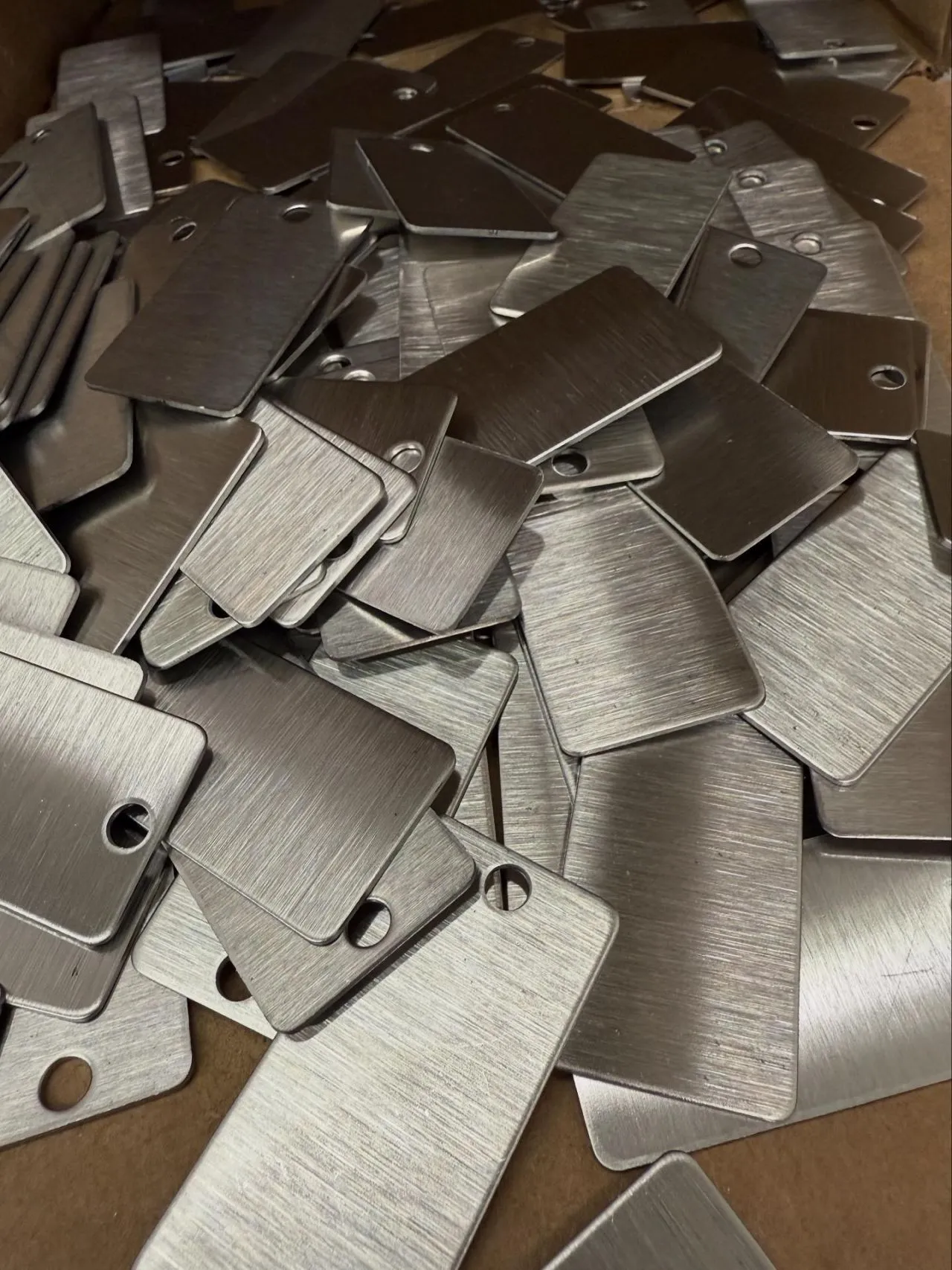 Custom metal nameplate applied on industrial equipment
