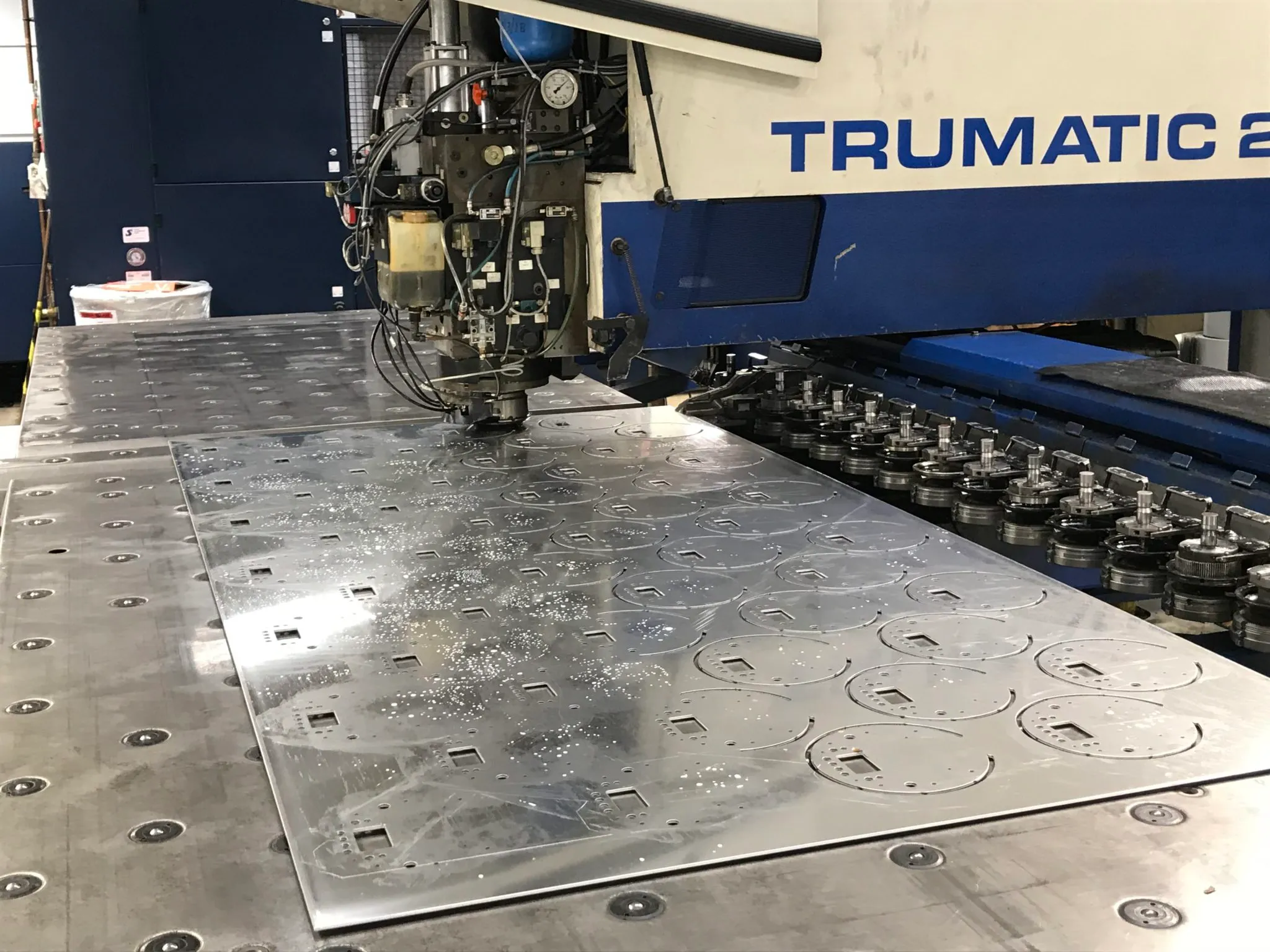 CNC punching machine forming metal tag blanks